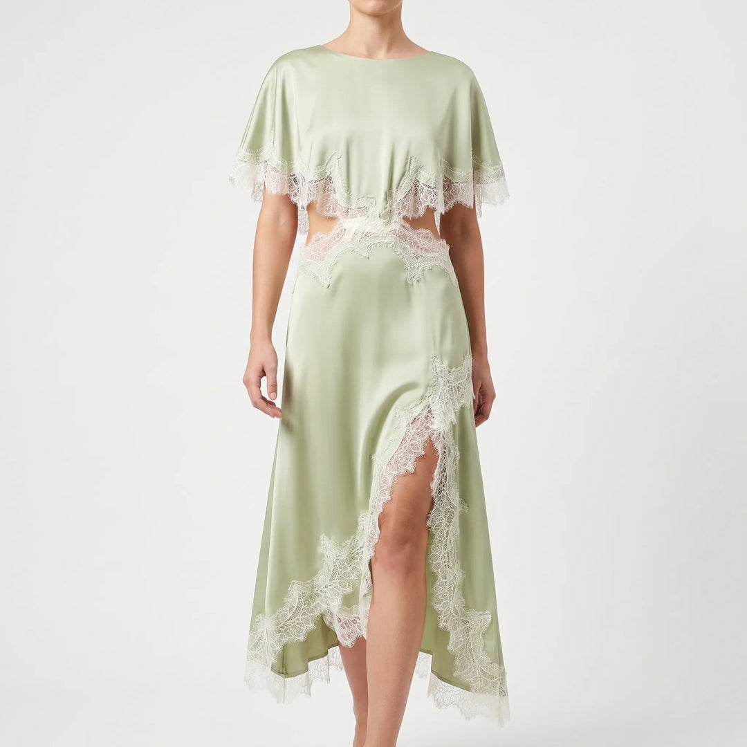 Trendy dames asymmetrische midi jurk in lichtgroen met comfortabele vleermuismouw. Ideaal als feest- of avondjurk.