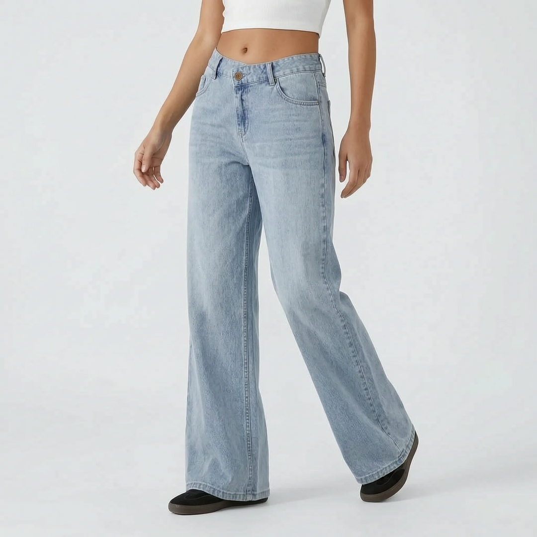 Trendy dames jeans: wijde pijpen, hoge taille en distinctieve asymmetrische knoopsluiting voor een unieke stijl.