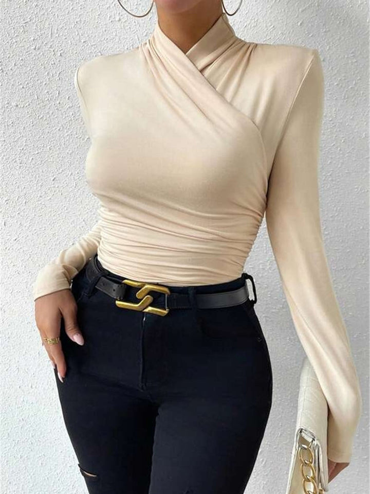 Comfortabel dames topje met lange mouwen, stijlvolle overslagkraag. Veelzijdig en casual.