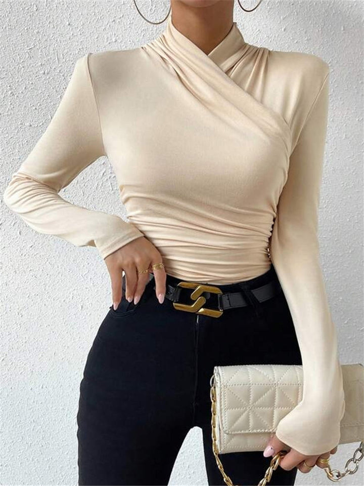 Getailleerd dames T-shirt met modieuze overslagkraag en lange mouwen, voor een elegante look.