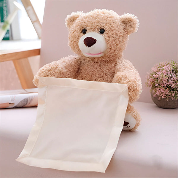 Schattige bruine pluche kiekeboe beer, ideaal interactief babyspeelgoed en peuterspeelgoed.