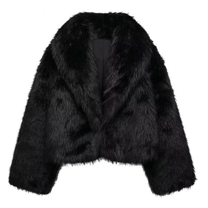 Elegante zwarte winterjas voor dames, moderne snit, tijdloos en warm.