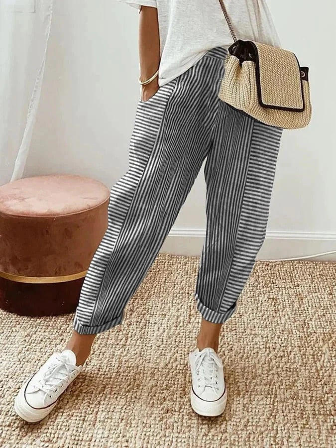 Comfortabele gestreepte dames zomerbroek met flatterende hoge taille en praktisch trekkoord voor de perfecte pasvorm.