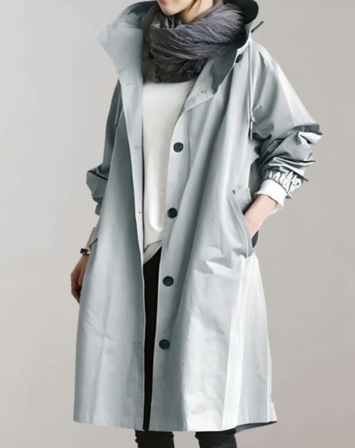 Elegante dames waterdichte trenchcoat met capuchon, ideaal voor herfst & winter. Nieuwe collectie warme en stijlvolle jas.