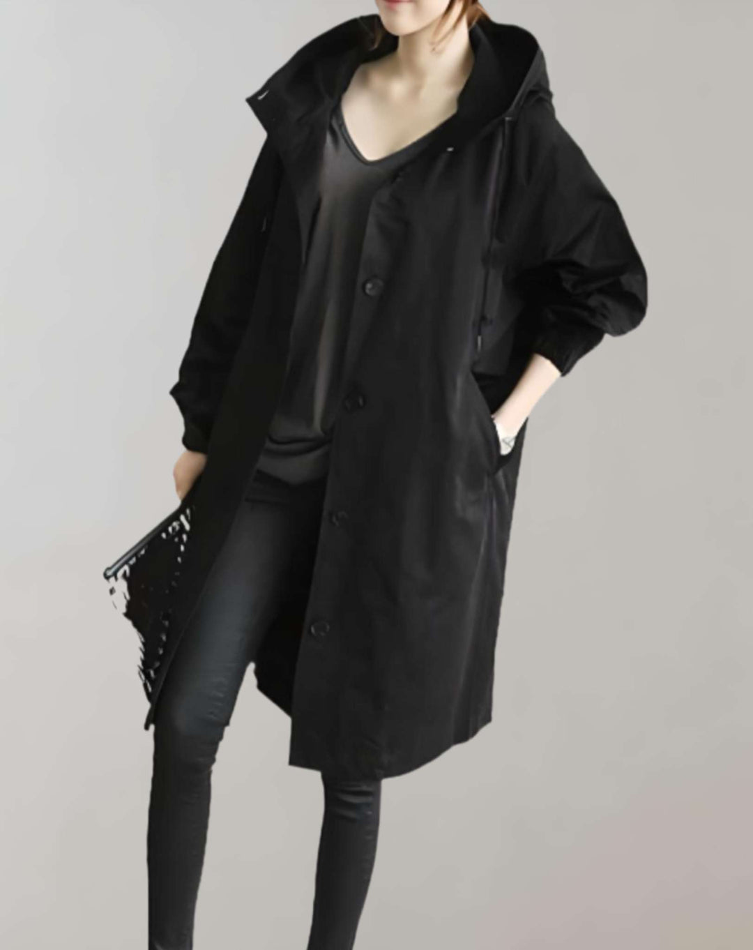 Warme waterdichte dames trenchcoat met capuchon. Comfortabele winterjas voor stijlvolle bescherming tegen weer.