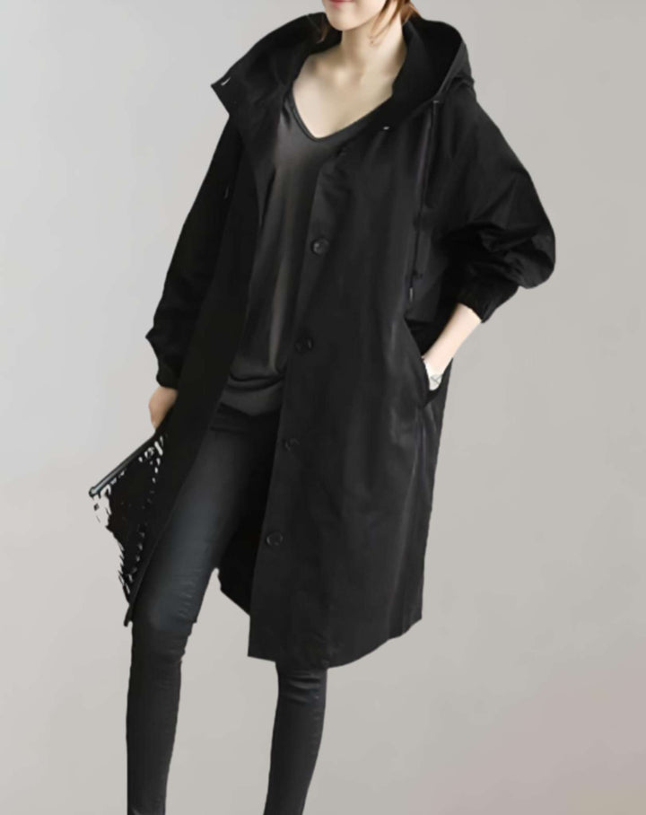 Warme waterdichte dames trenchcoat met capuchon. Comfortabele winterjas voor stijlvolle bescherming tegen weer.