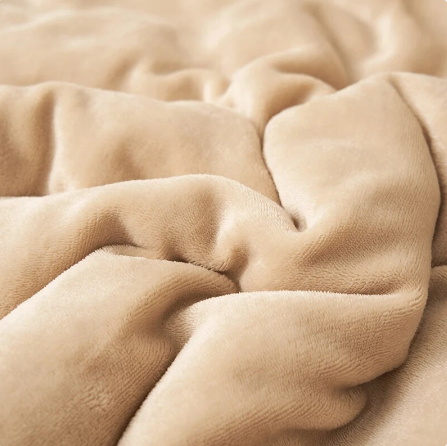 SoftHug luxe warme fleecedeken, prachtig verpakt als ideaal cadeau voor comfort en warmte.