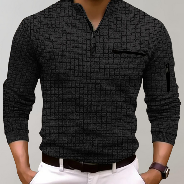 Stijlvolle Jasper herenpolo met lange mouwen van katoen, perfect voor casual herenmode.