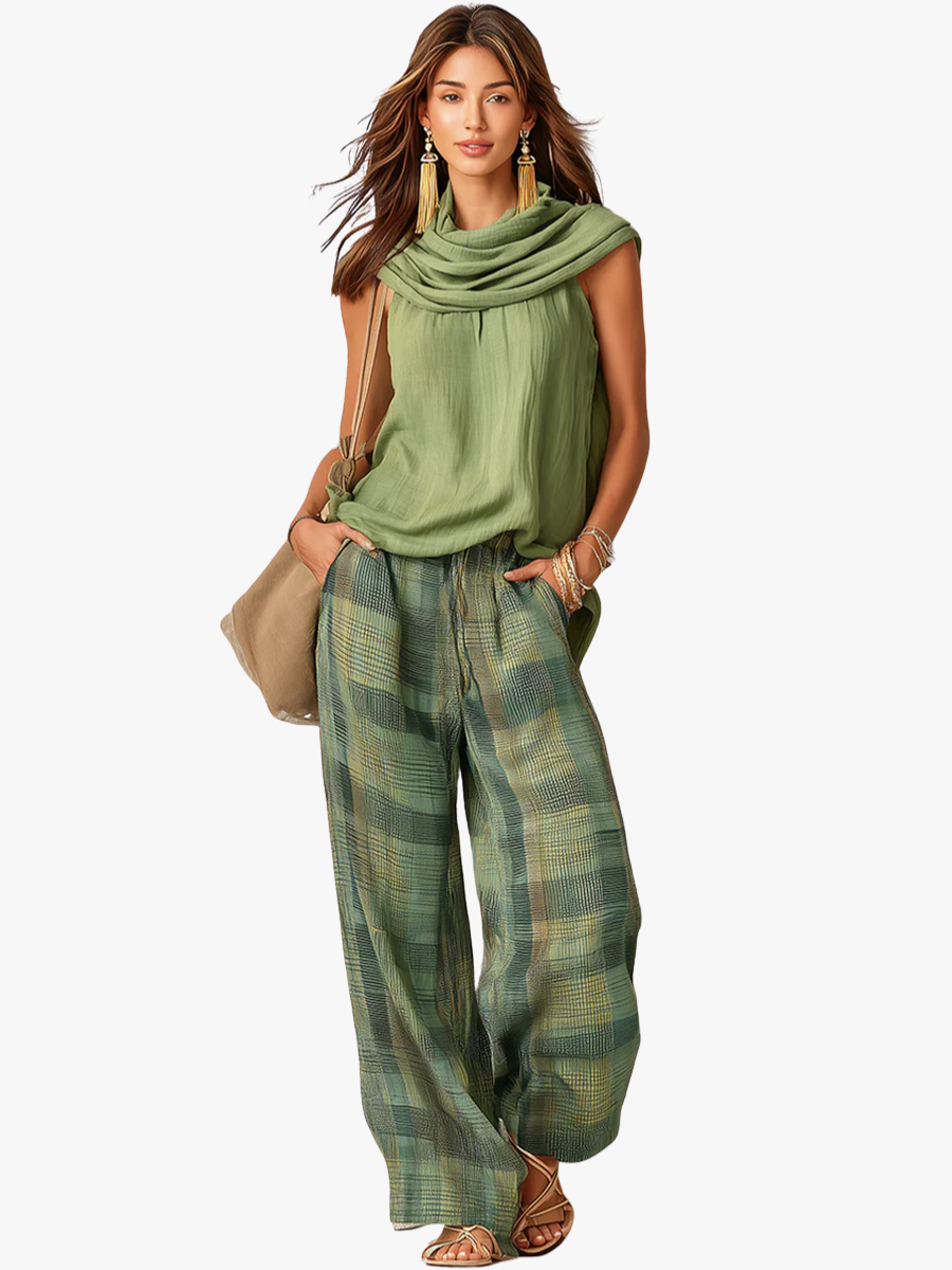 Groene tweedelige dames set met comfortabele blouse en wijde broek voor een elegante, relaxte zomerlook.