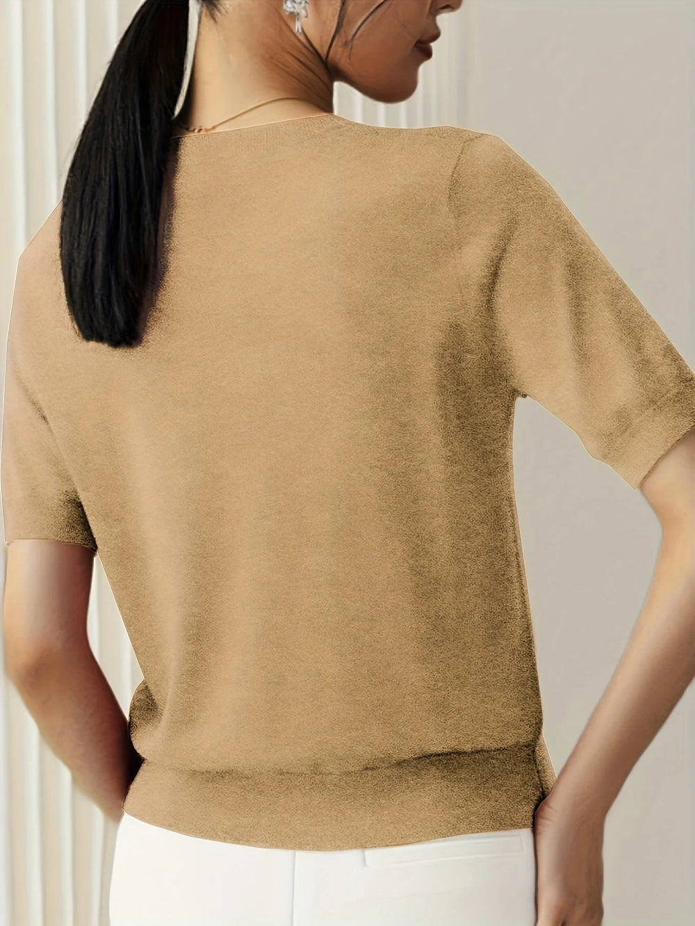 Trendy Mira dames trui, losvallend model met korte mouwen; ideaal voor casual lente mode.