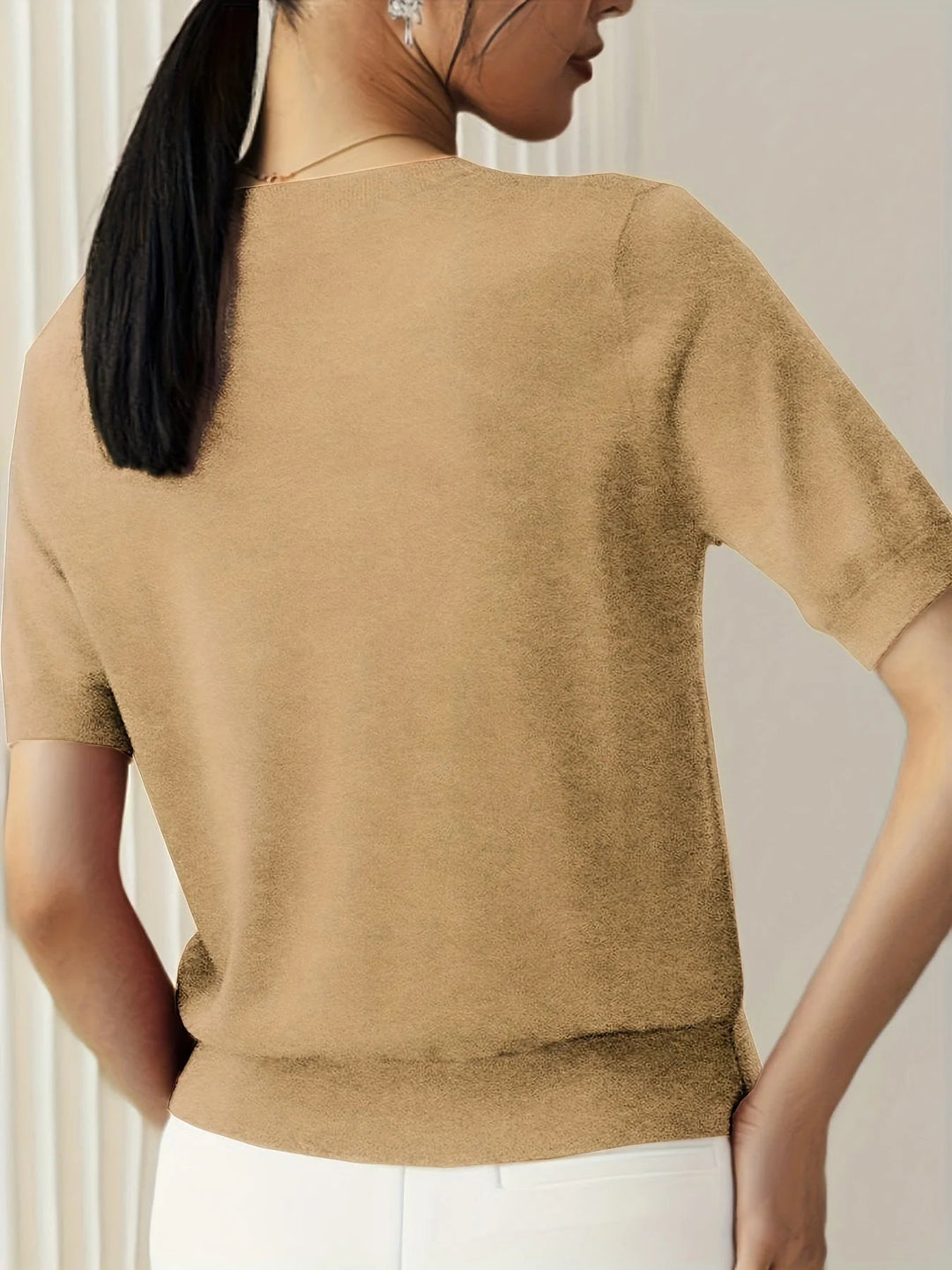 Trendy Mira dames trui, losvallend model met korte mouwen; ideaal voor casual lente mode.
