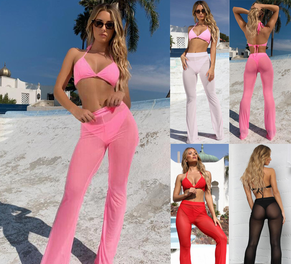 Luchtige witte dames bikini broek, flared stijl, essentieel voor een dagje strand.