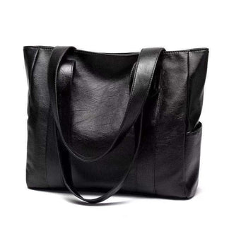 Bruine vintage leren schoudertas voor dames, een klassiek en duurzaam mode accessoire.