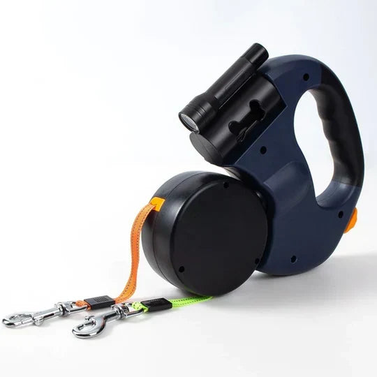 Compacte intrekbare dubbele hondenriem met ergonomisch handvat, perfect voor dagelijkse wandelingen.