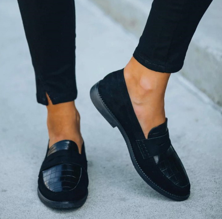 Platte zwarte dames loafers, stijlvol en comfortabel, een must-have voor damesmode en dagelijks gemak.