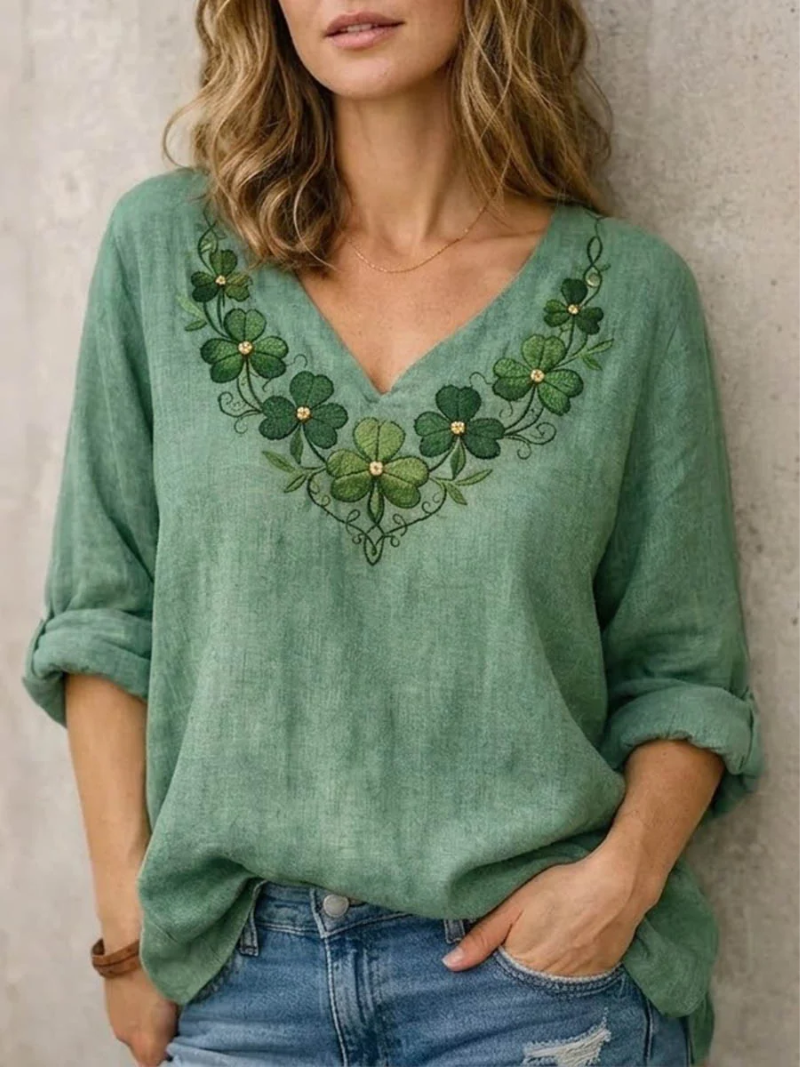 Elegante dames blouse met V-hals en verfijnd borduursel. Modieuze top met lange mouwen, ideaal voor casual chic.