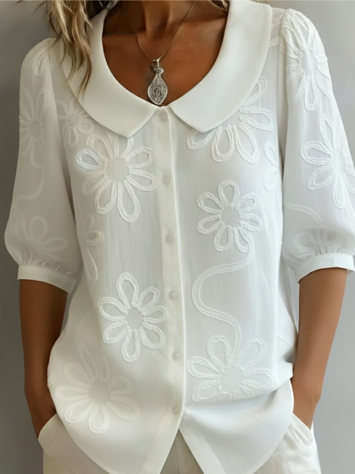 Veelzijdige casual/smart casual dames blouse met bloemen borduursel, ideaal voor dagelijkse lente-look.