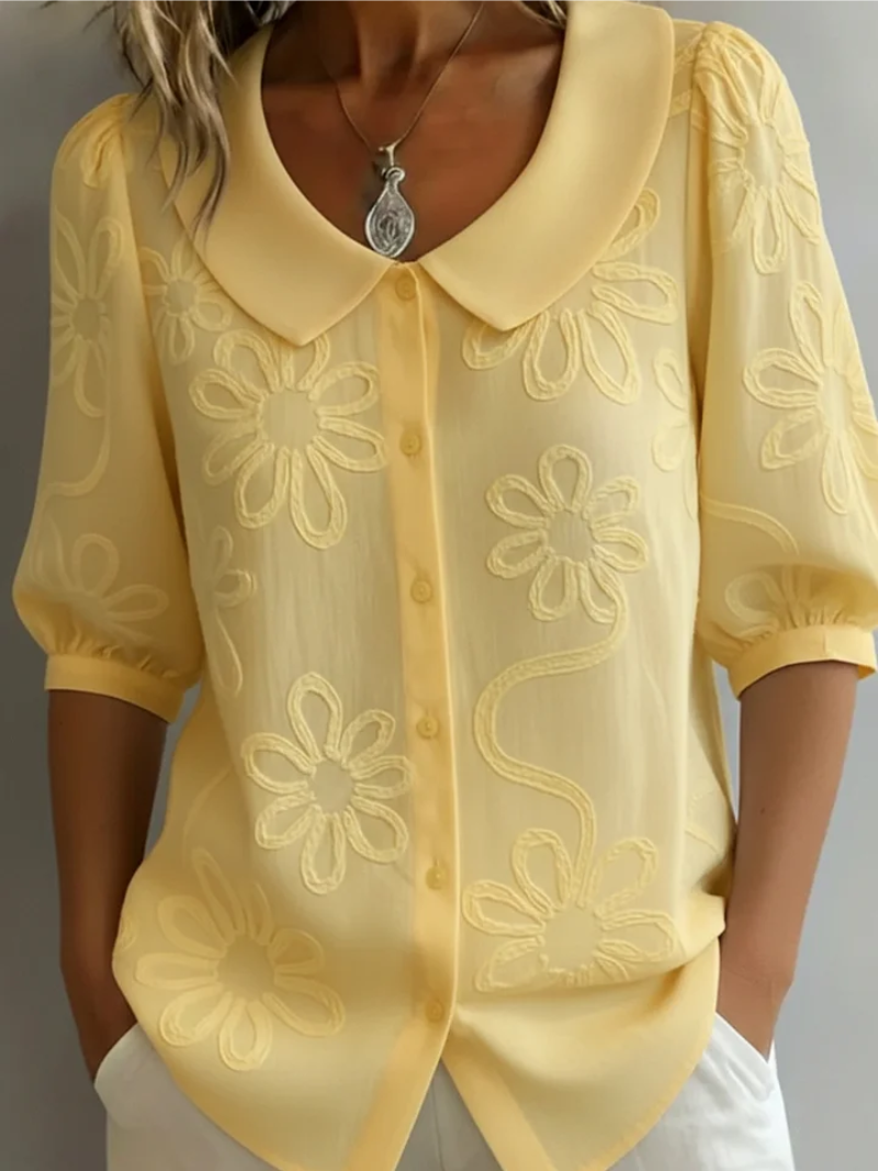 Dames blouse met elegant bloemen borduursel en comfortabele pasvorm, perfect voor lente/zomer.