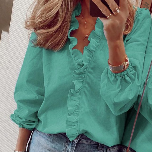 Stijlvolle dames blouse met volantkraag en V-hals. Losvallend model, perfect voor lente & zomer.