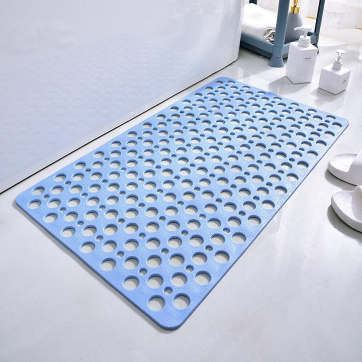Snel afwaterende antislip douchemat met zuignappen voor optimale veiligheid in de badkamer.