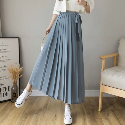 Casual tot elegant: geplooide damesbroek met hoge taille en wijde pijpen; veelzijdige vrouwenkleding.