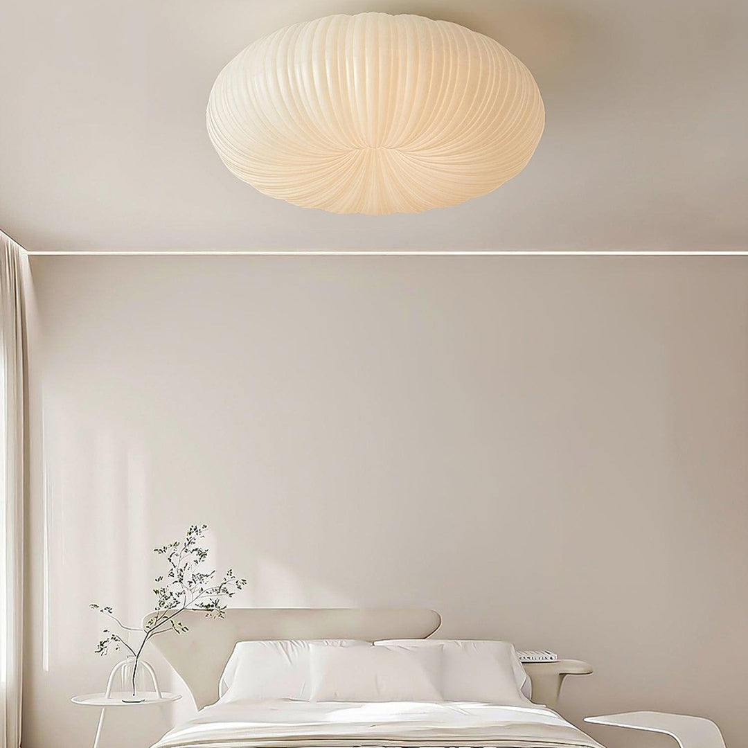 Ronde, moderne Robby plafondlamp; dimbare LED verlichting voor sfeervolle slaapkamer.