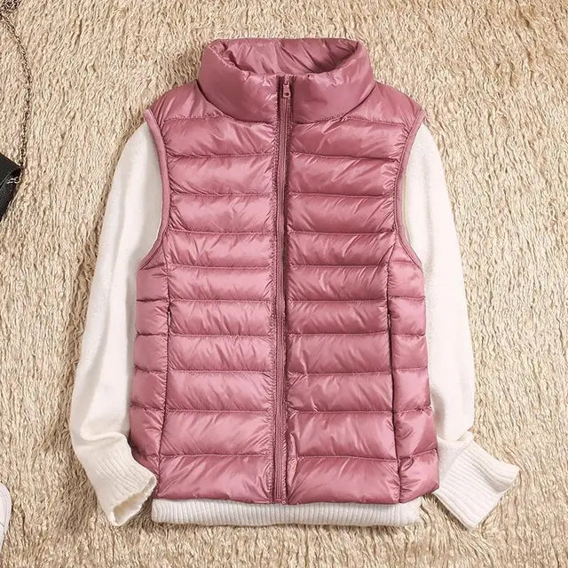 Dames bodywarmer gedragen over een trui, toont veelzijdigheid voor layering en extra warmte in de herfst.