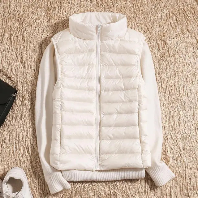 Vrouwelijke pasvorm van de winddichte dames bodywarmer, stijlvol en comfortabel voor dagelijks gebruik.