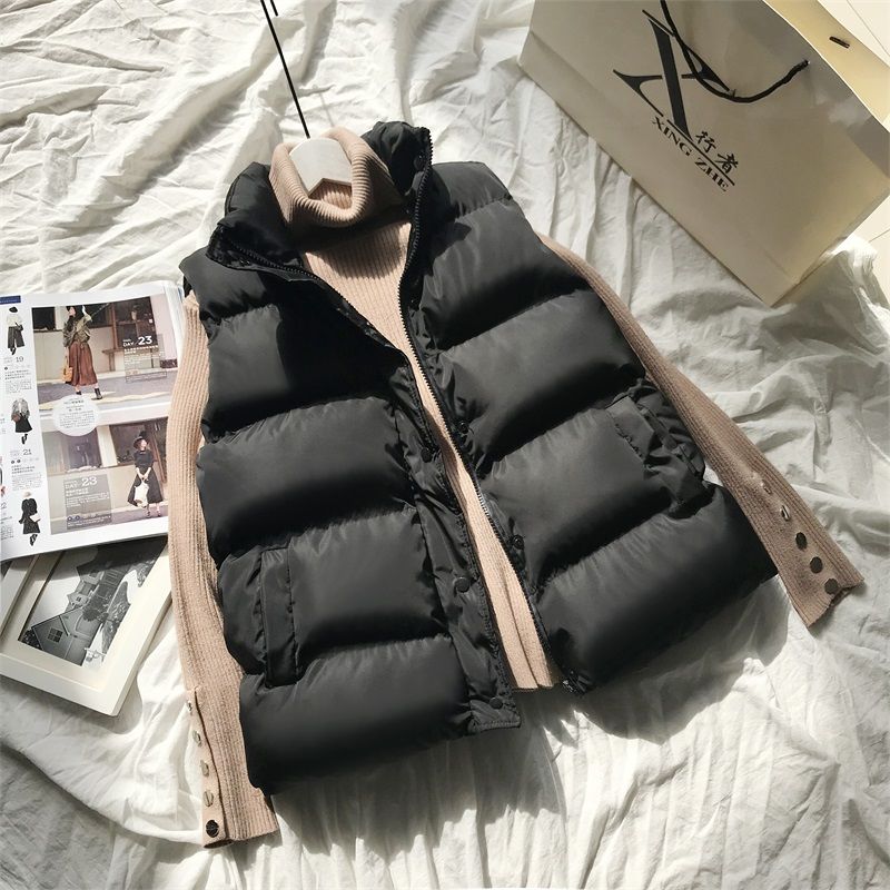 Zwarte dames bodywarmer, warm en stijlvol, ideaal mouwloos vest voor lente, herfst of outdoor.