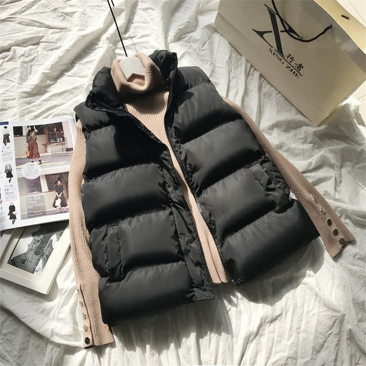 Zwarte dames bodywarmer, warm en stijlvol, ideaal mouwloos vest voor lente, herfst of outdoor.