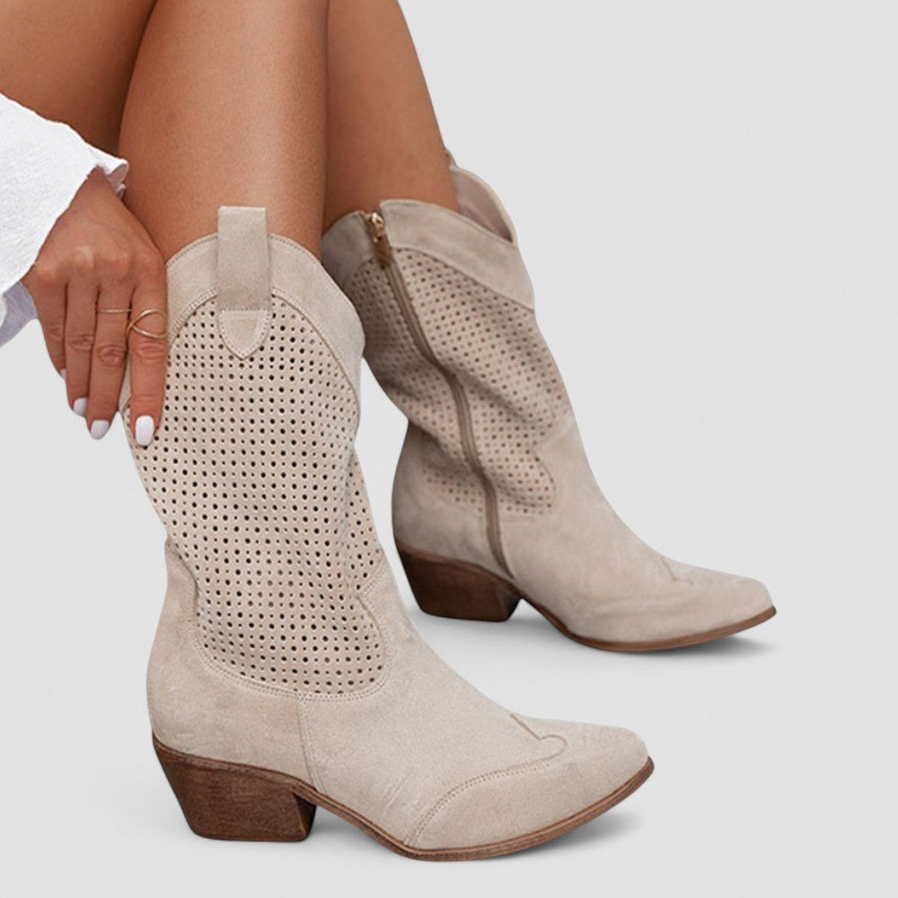 Elegante damesboots met stabiele blokhak en spitse neus, biedt comfort en ondersteuning.