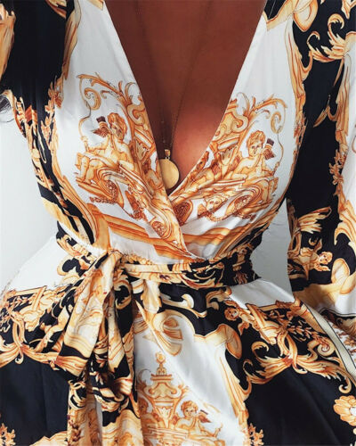Slangenprint dames wikkeljurk met split, v-hals. Lange mouwen, elegante party jurk, ideale zomerse maxi jurk.