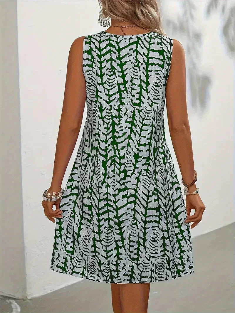 Lichtgewicht dames mini-jurk, mouwloos met vrolijke abstracte print, ideaal voor zomers comfort.