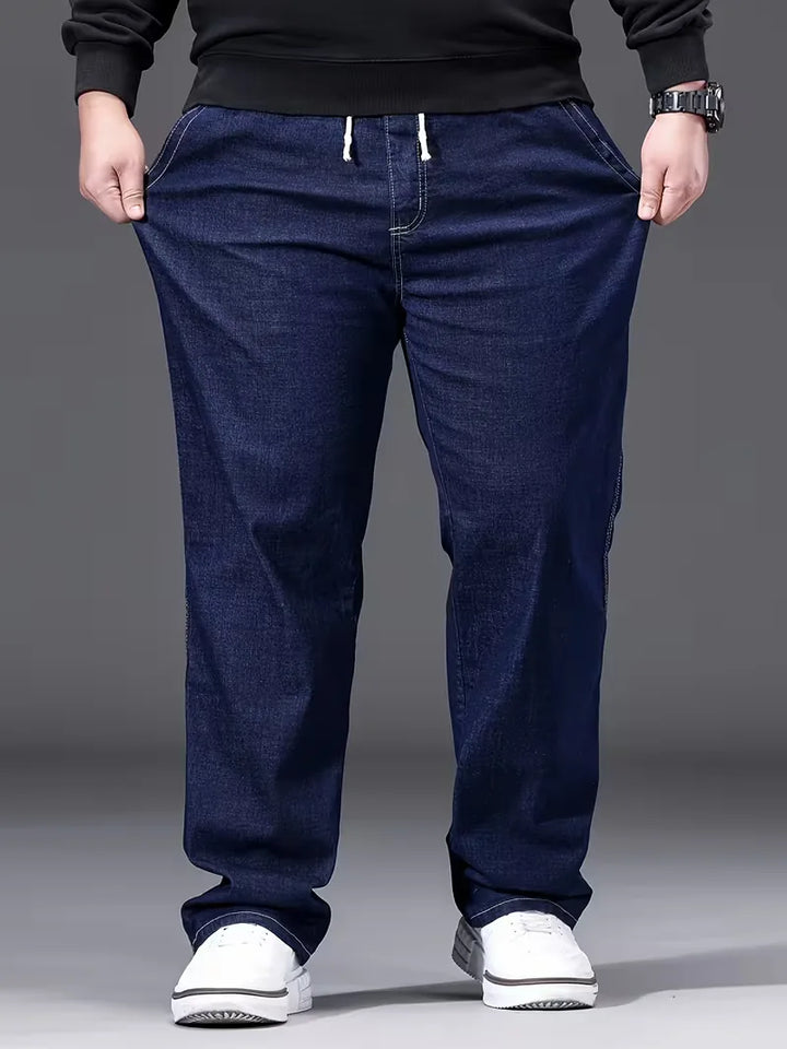 Heren baggy jeans met losse pasvorm en elastiek, comfortabele spijkerbroek voor herenmode.