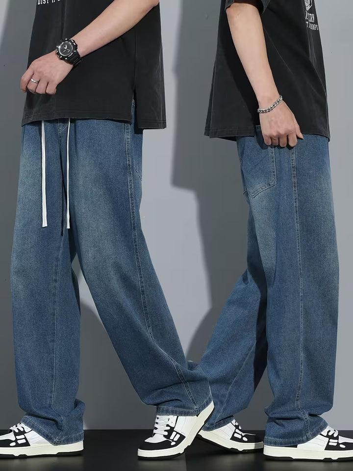 Dichtbij shot van de stof van de straight fit heren jeans. Casual, comfortabel en losse pasvorm.