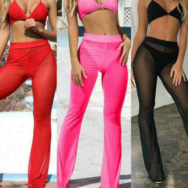 Elegante zwarte strandbroek voor dames, flared model, perfect als chique cover-up.