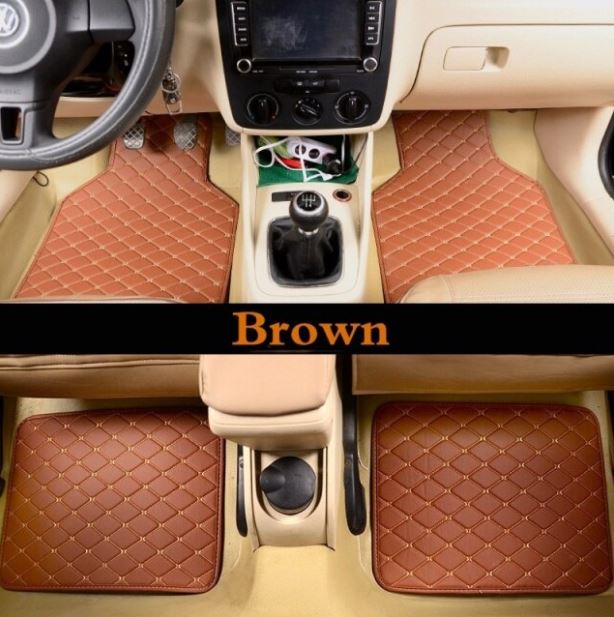 Complete set universele auto vloermatten, synthetisch leer, klaar om uw voertuiginterieur te beschermen en te verfraaien.