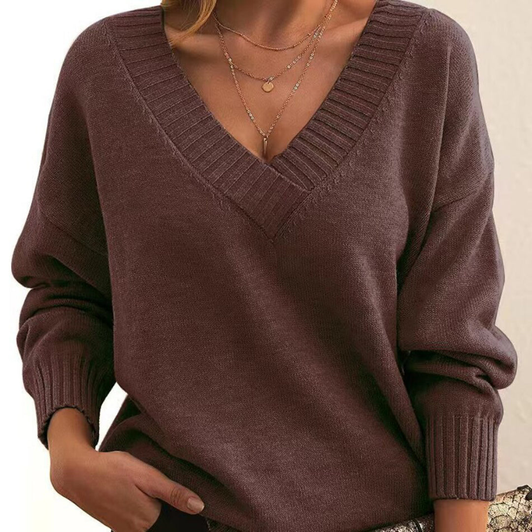 Elegante dames V-hals trui met relaxte pasvorm, veelzijdig voor casual of geklede look, zachte stof.