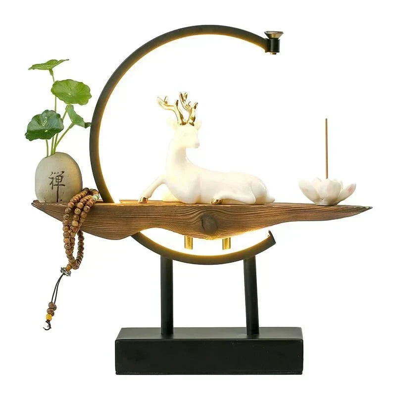 Decoratieve witte hert lamp en wierookbrander, ideaal voor meditatie en een serene ambiance.