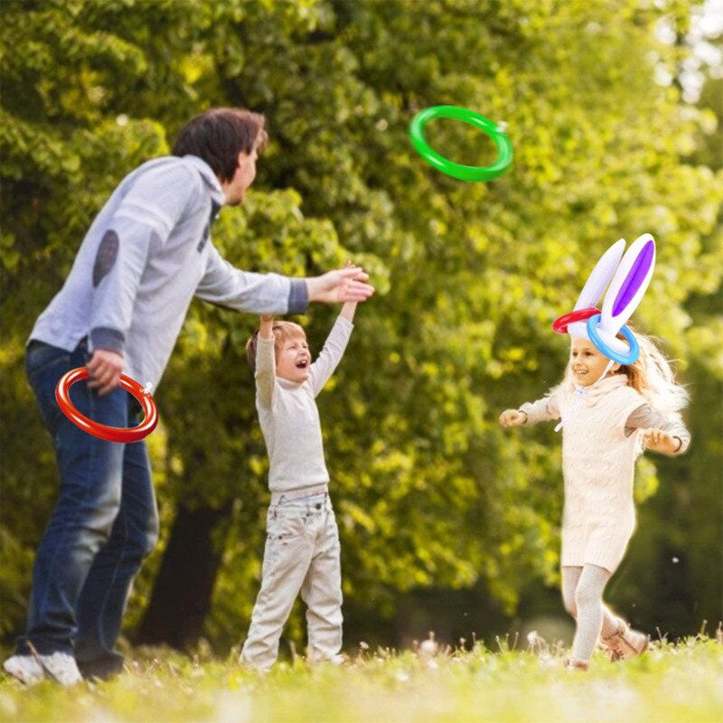 Duidelijk beeld van het opblaasbare konijnen hoofdband werpspel speelgoed met ringen, klaar voor een feestje.