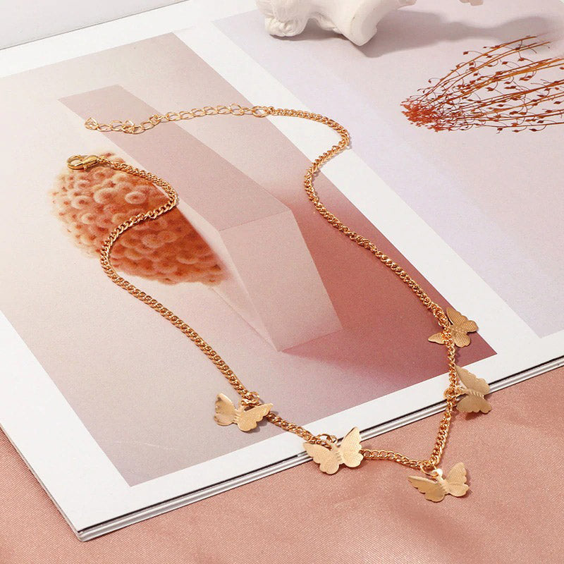 Verfijnde dames ketting met vlinder hanger, goudkleurig.
