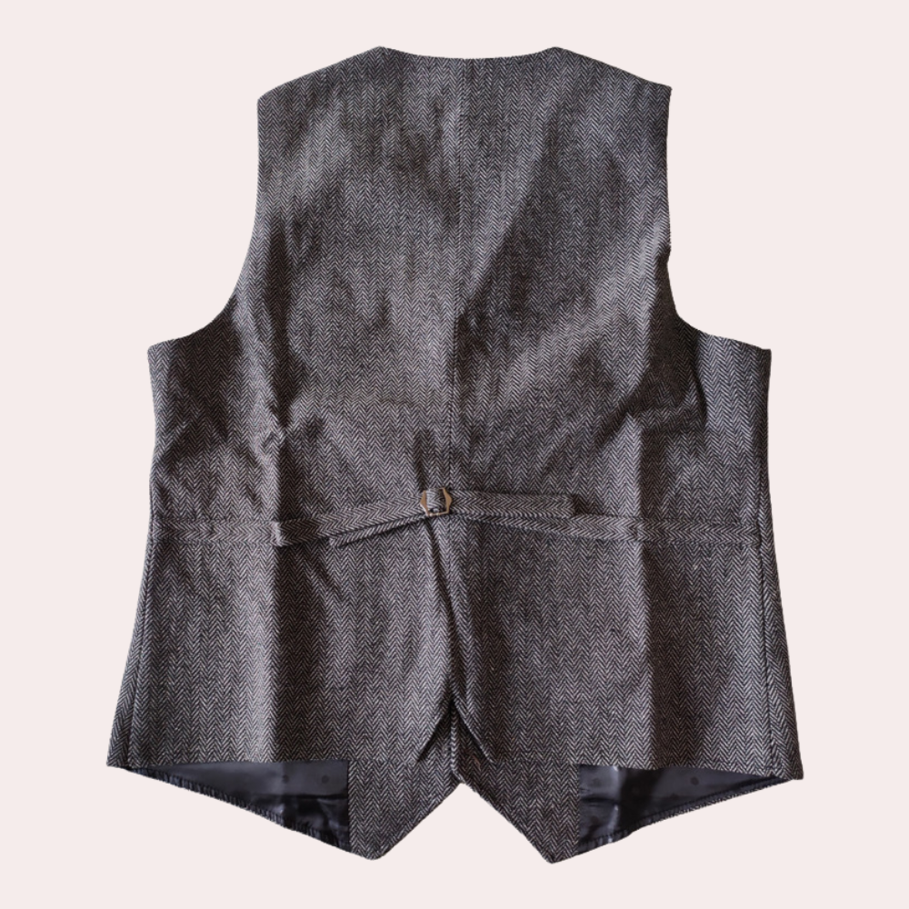 Getailleerd zwart heren gilet, perfecte kleding voor een zakelijke afspraak of feestelijke gelegenheid.