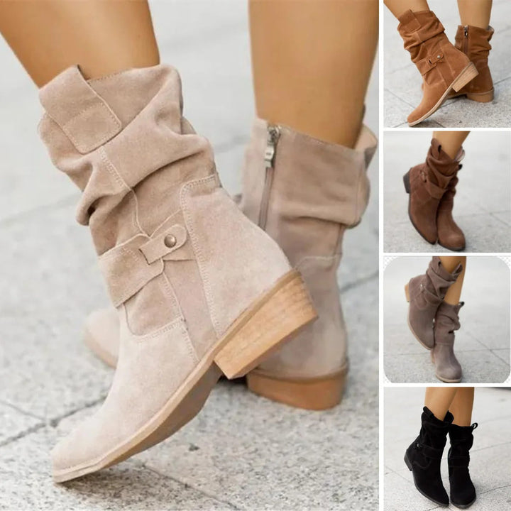 Zwarte dames enkellaarsjes met lage hak voor comfort en stijl. Perfecte mode voor herfst en winter.