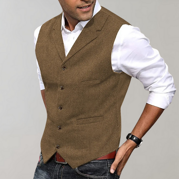 Elegant grijs tweed vest voor heren, ideaal voor wintermode en een stijlvolle smartcasual look.