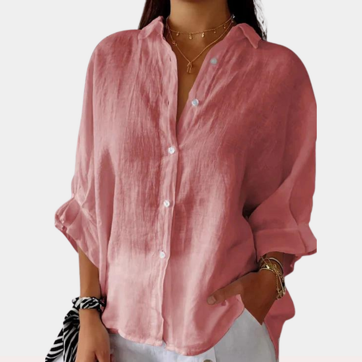 Veelzijdige linnen blouse met knoopsluiting en lange mouwen, ideaal voor lente, zomer en herfst outfits.