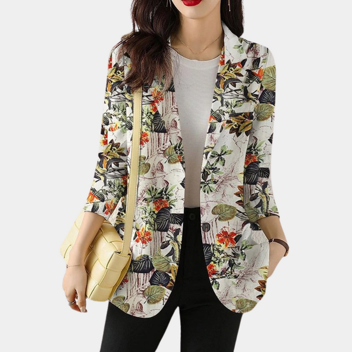 Veelzijdige gebloemde dames blazer, geschikt voor zowel zakelijke als casual gelegenheden. Modieus jasje.