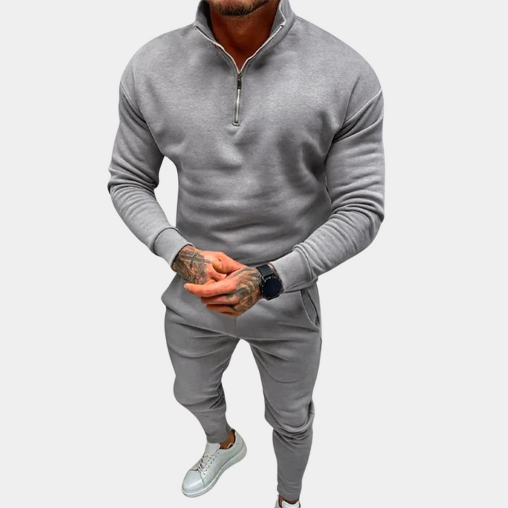 Heren tracksuit, perfect als sportpak of vrijetijdskleding. Actieve kleding voor comfort en stijl.