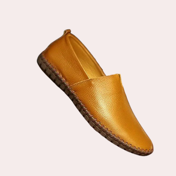 Milan heren instappers: Zwarte PU-leren mocassins met flexibele zool, ideaal voor optimaal comfort en dagelijks gebruik.