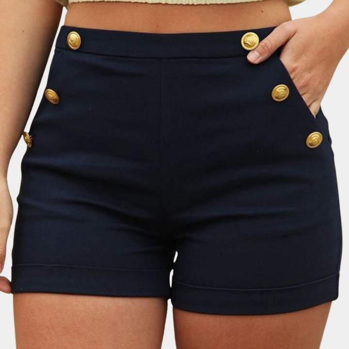 Elegante zwarte damesshorts met hoge taille, perfect voor een chique zomerlook of modieuze casual outfit.