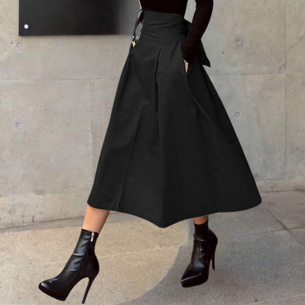 Elegante groene dames high-waist A-lijn rok Elina met strikdetail; perfect voor een tijdloze, vrouwelijke look.